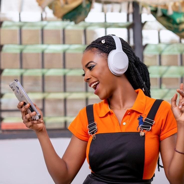 Kaveri Mehta, Lead Design Curator at InvestaLudexi, reviewing corporate floral arrangements